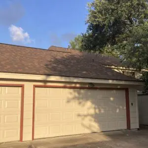 GAF Timberline® asphalt shingles installed by Allied Exteriors on a residential garage roof in Houston, Texas.