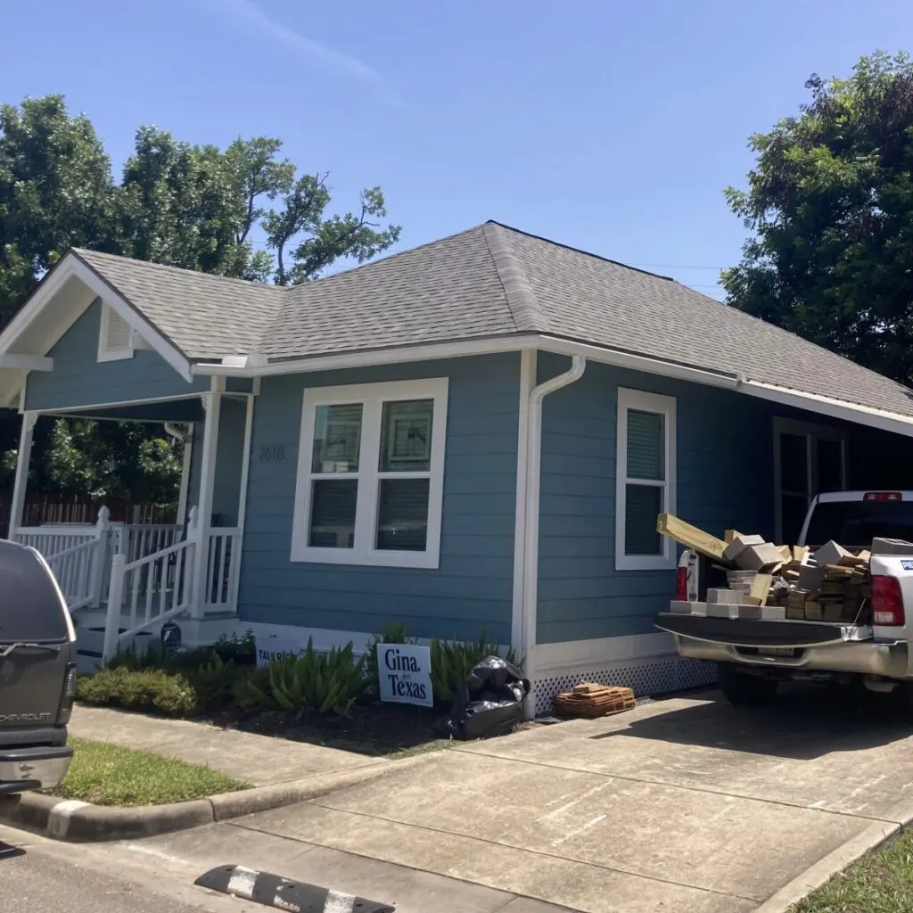 Owens Corning® Duration® asphalt shingles installed by Allied Exteriors on a blue home in Houston, Texas.