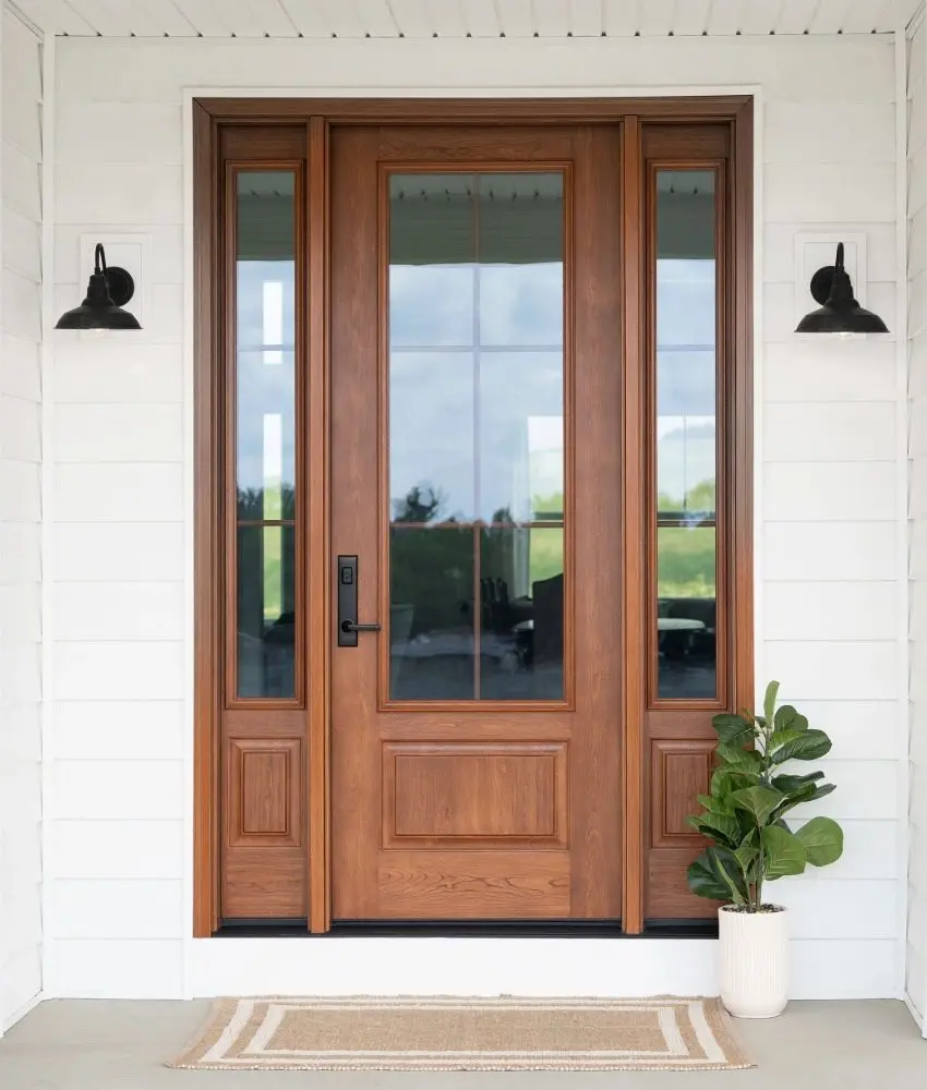 ProVia Signet fiberglass entry door in Cherry 440 with stained decorative glass and matching sidelites.