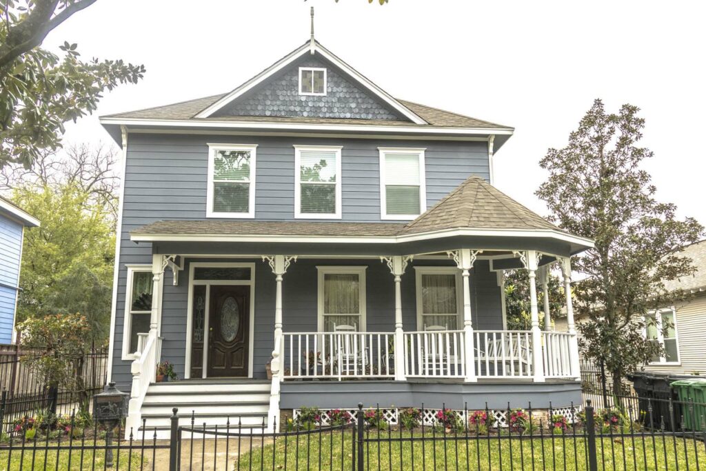 Grey-blue two story home with Hardie plank siding.