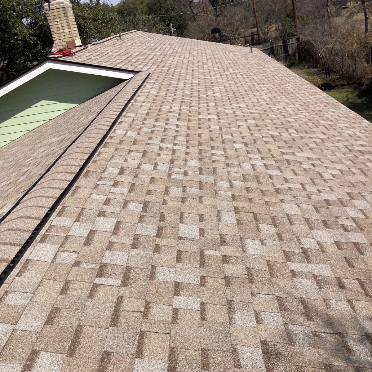 Roof replacement in Austin, Texas with dimensional Owens Corning asphalt shingles