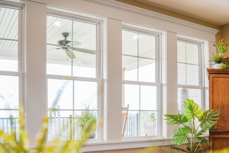 Four double hung white window with internal grids