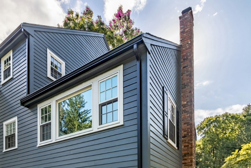 Home with Hardie plank siding in Evening Blue with Arctic White trim.