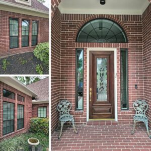 Bronze replacement windows installed by Allied Exteriors on a red brick home in Spring, Texas.