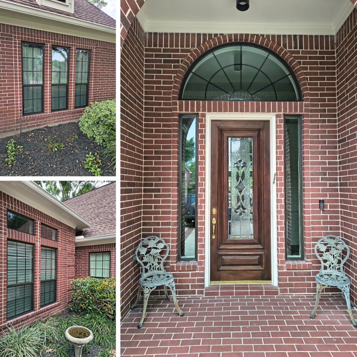 Bronze replacement windows on a red brick home