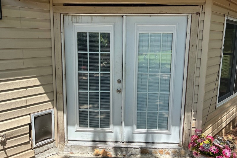 warped patio door with staining